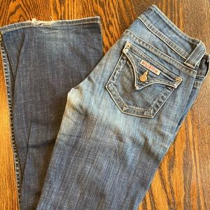 Great condition pair of jeans with minimal fray at bottom of legs.